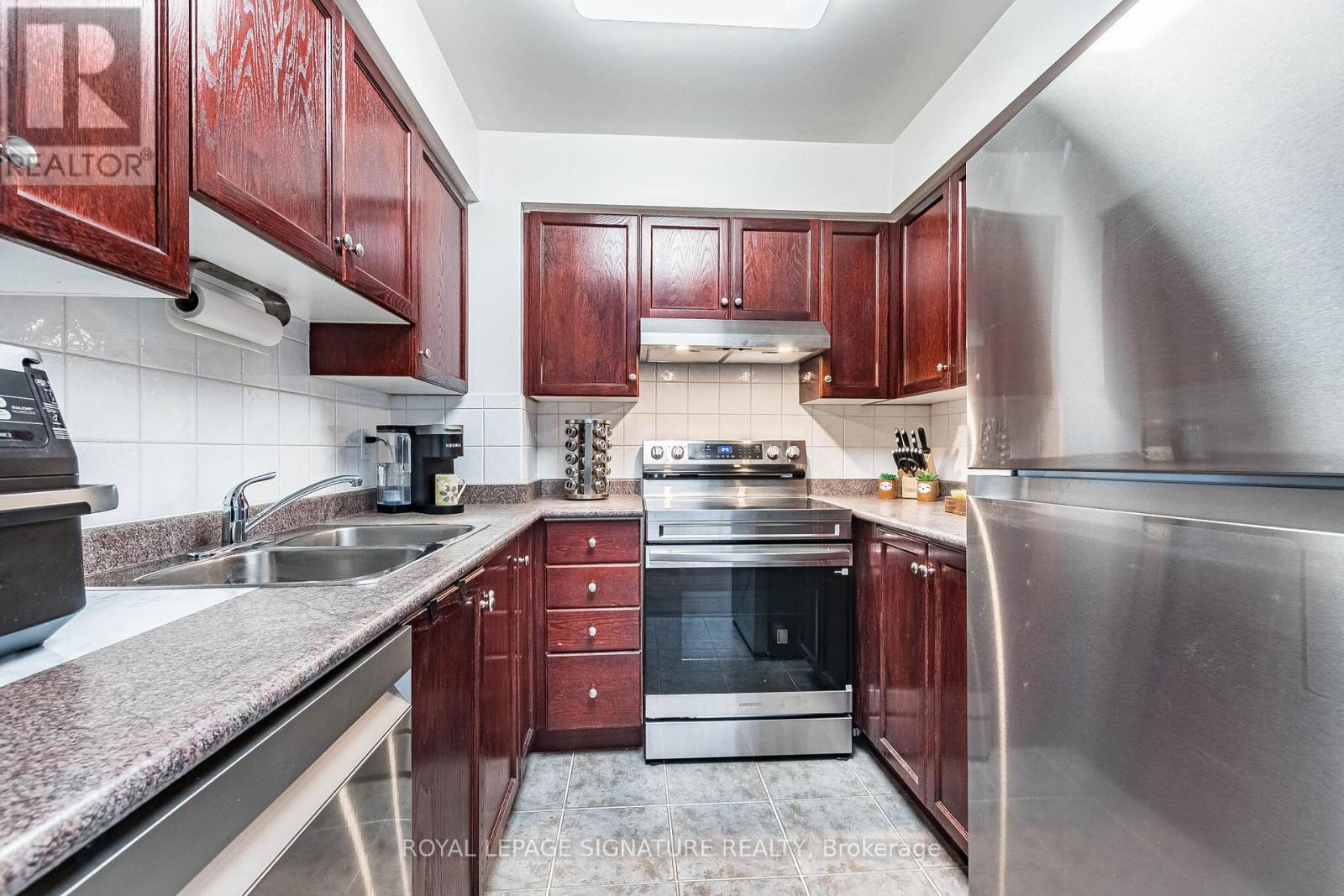 408 - 35 Kingsbridge Garden Circle, Mississauga, Ontario  L5R 3Z5 - Photo 26 - W12943924