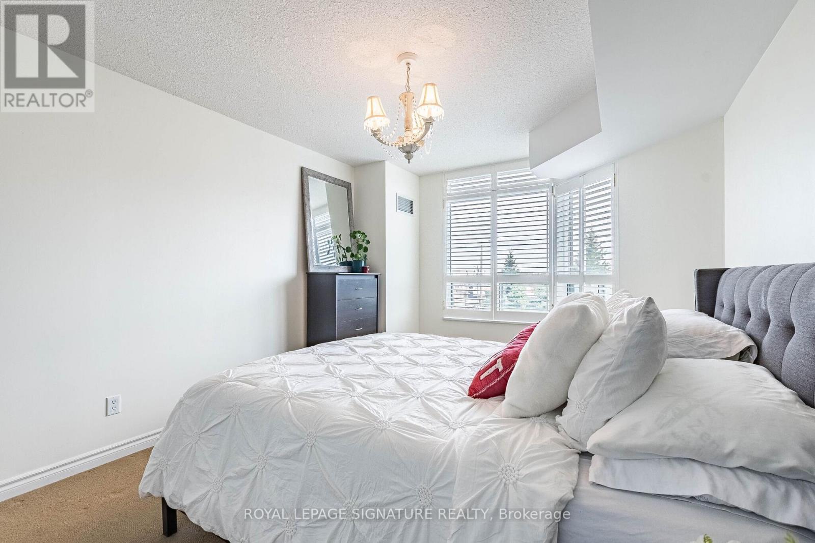 408 - 35 Kingsbridge Garden Circle, Mississauga, Ontario  L5R 3Z5 - Photo 32 - W12943924