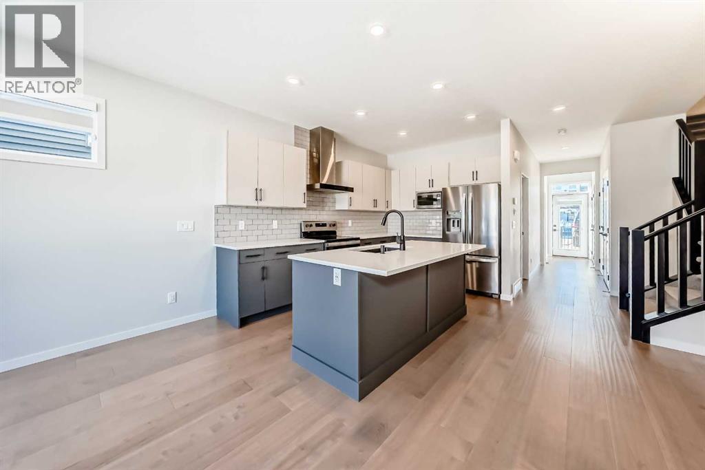 535 Tekarra Drive NW, Calgary, Alberta  T3R 2G4 - Photo 5 - A2284353