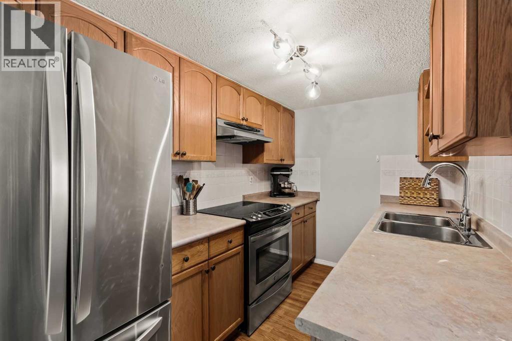 43, 1055 72 Avenue NW, Calgary, Alberta  T2K 5S4 - Photo 8 - A2298145