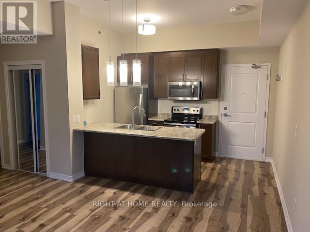 824 - 2490 Old Bronte Road, Oakville, Ontario  L6M 4J2 - Photo 3 - W12944814