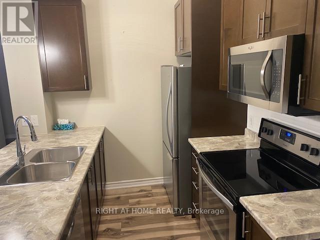 824 - 2490 Old Bronte Road, Oakville, Ontario  L6M 4J2 - Photo 4 - W12944814