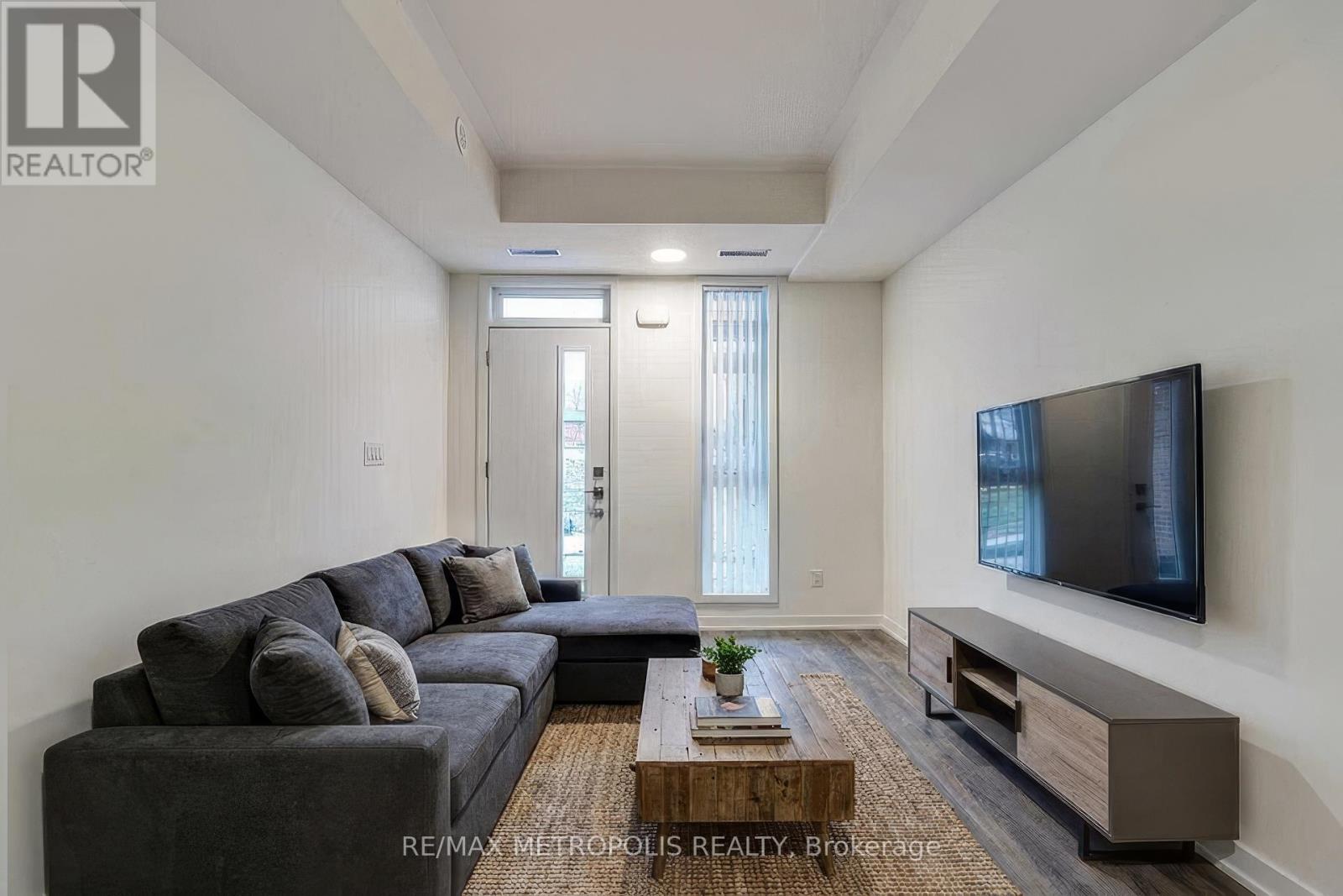 H105 - 90 Canon Jackson Drive, Toronto, Ontario  M6M 0C1 - Photo 3 - W12945304