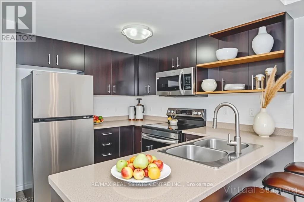 202 - 41 Goodwin Drive, Guelph, Ontario  N1L 0E7 - Photo 6 - X12945292