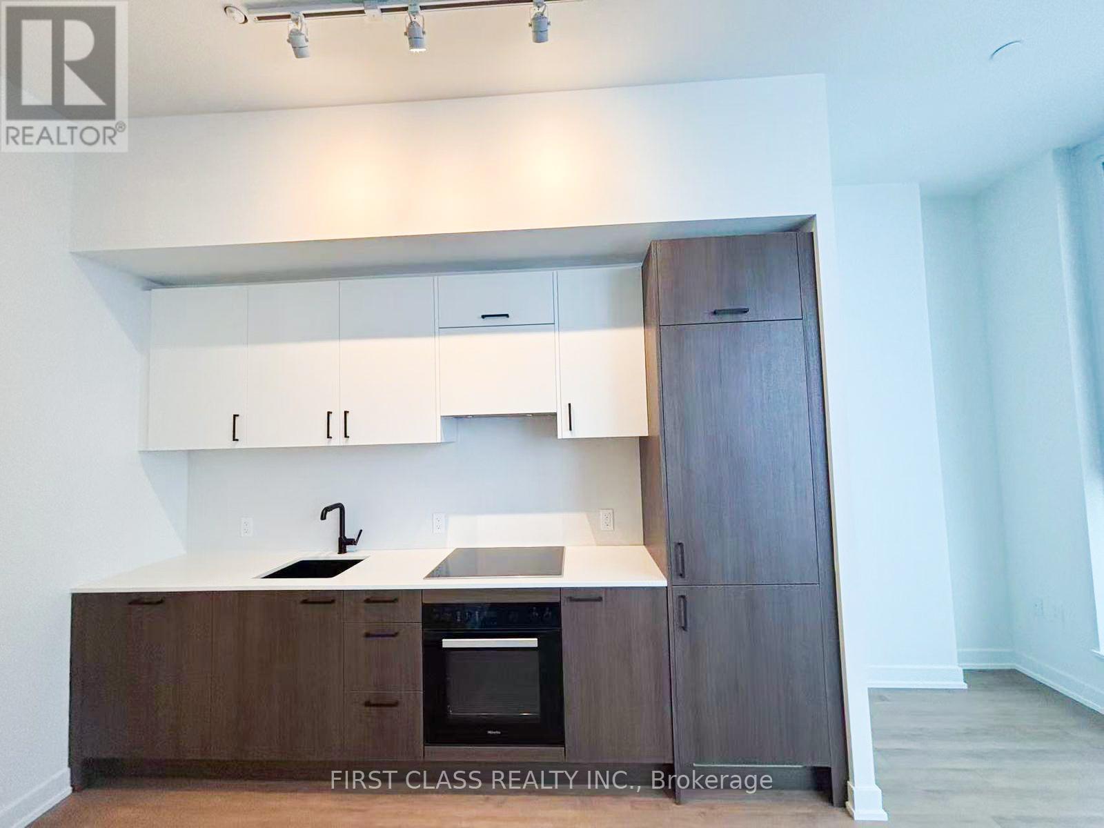 2112 - 1 Quarrington Lane, Toronto, Ontario  M3C 0S4 - Photo 1 - C12945544