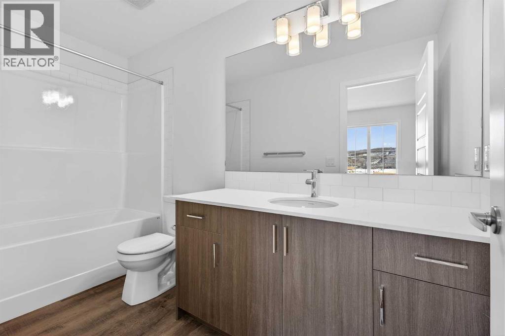 56 Creekside Drive SW, Calgary, Alberta  T2X 6E2 - Photo 20 - A2282815