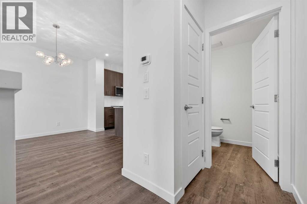 56 Creekside Drive SW, Calgary, Alberta  T2X 6E2 - Photo 8 - A2282815