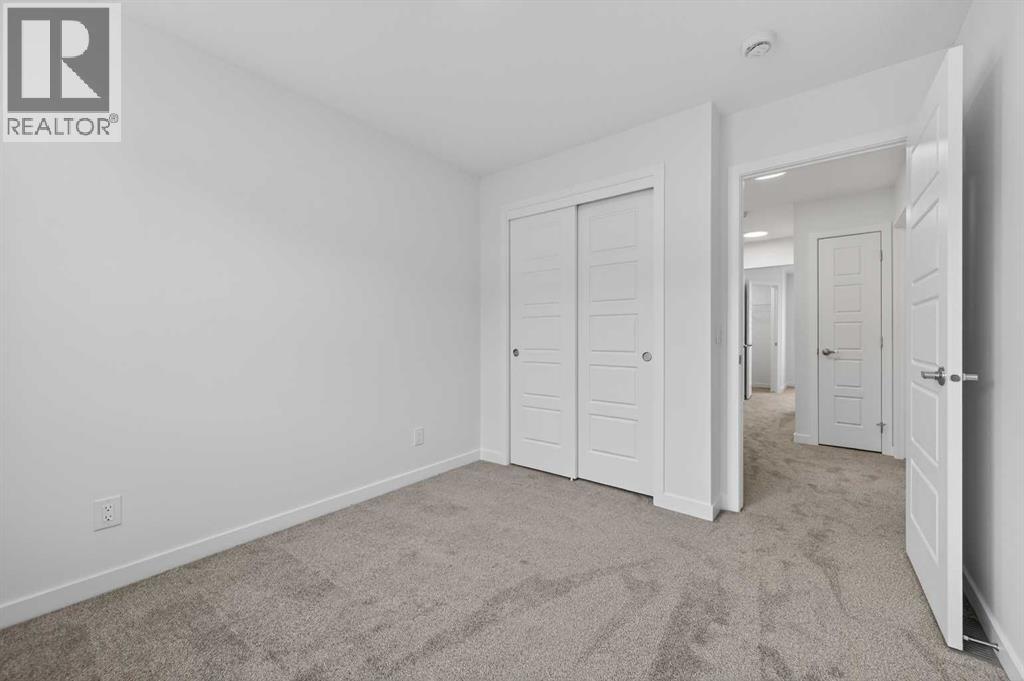 56 Creekside Drive SW, Calgary, Alberta  T2X 6E2 - Photo 25 - A2282815