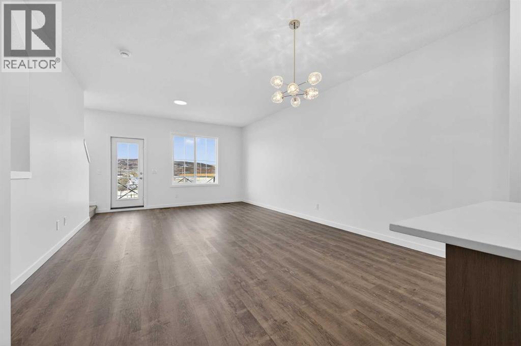 56 Creekside Drive SW, Calgary, Alberta  T2X 6E2 - Photo 10 - A2282815