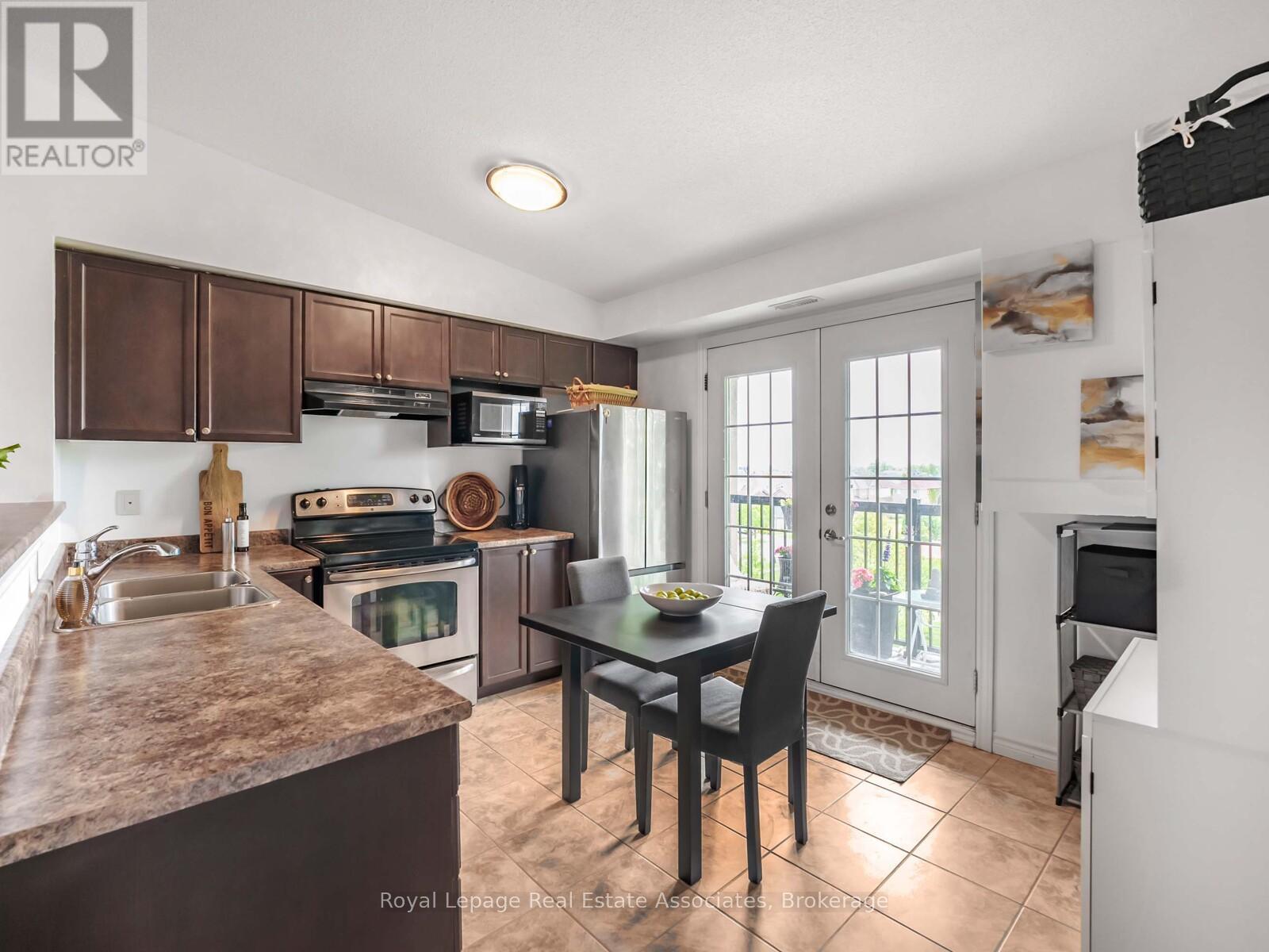 405 - 1390 Main Street E, Milton, Ontario  L9T 7S9 - Photo 6 - W12945616