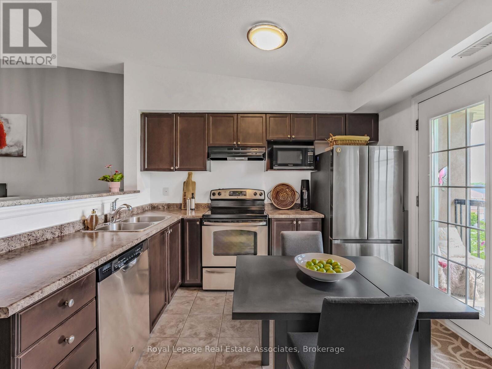 405 - 1390 Main Street E, Milton, Ontario  L9T 7S9 - Photo 7 - W12945616