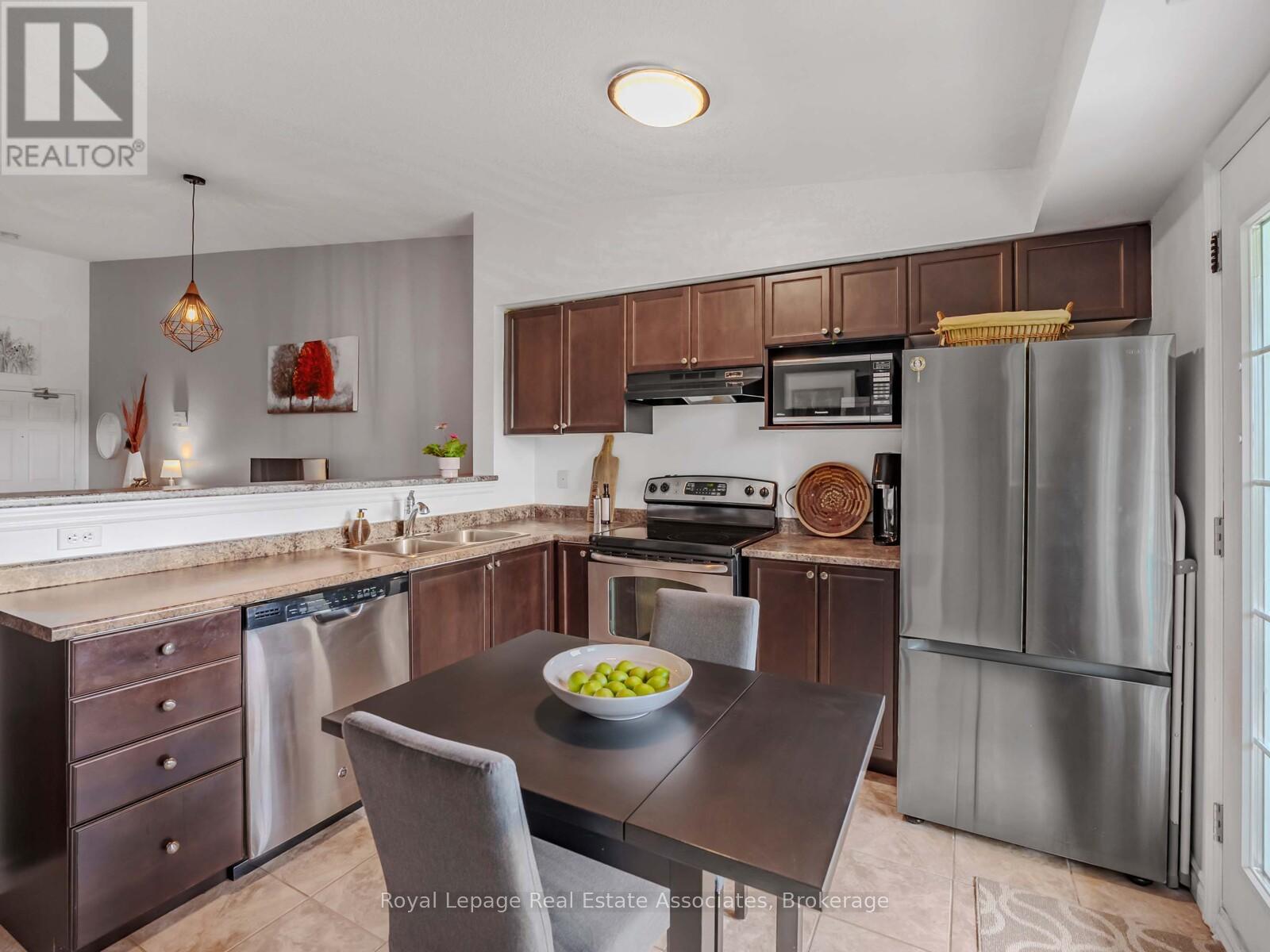 405 - 1390 Main Street E, Milton, Ontario  L9T 7S9 - Photo 8 - W12945616