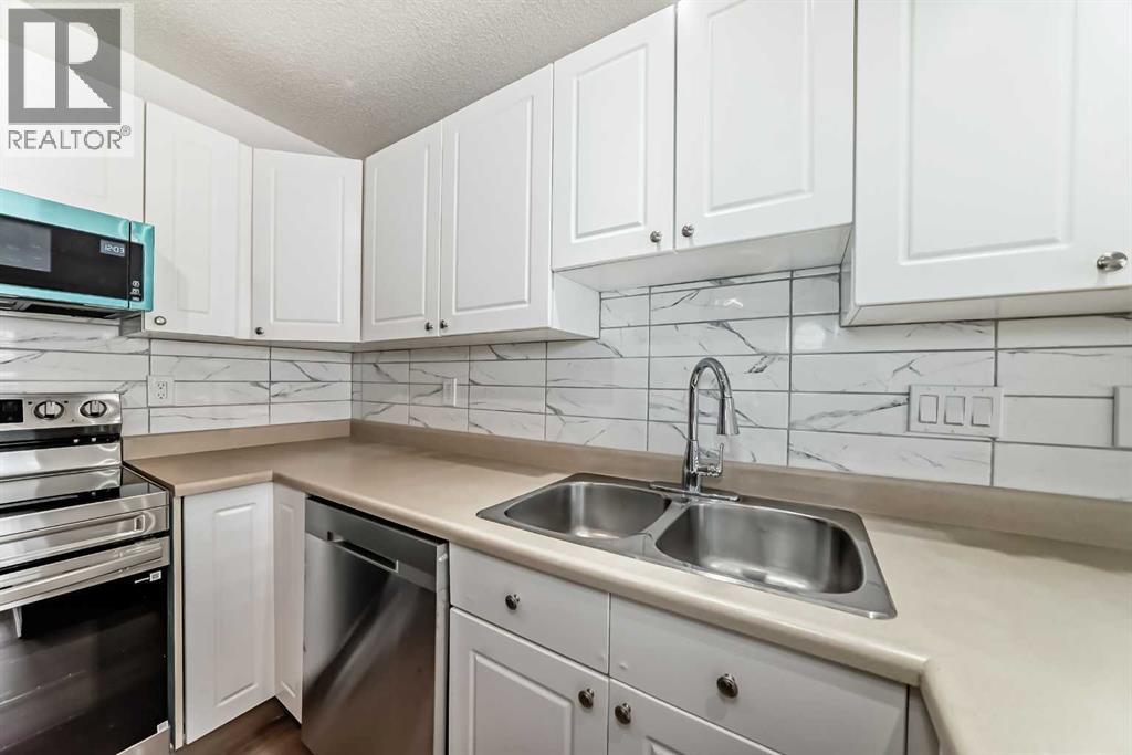 50 Del Monica Villas Ne, Calgary, Alberta  T1Y 6Z5 - Photo 9 - A2287407