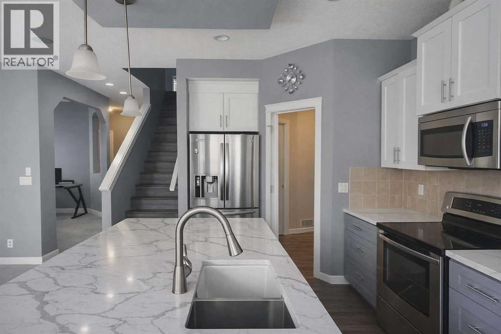 1580 New Brighton Drive SE, Calgary, Alberta  T2Z 0P8 - Photo 4 - A2293990