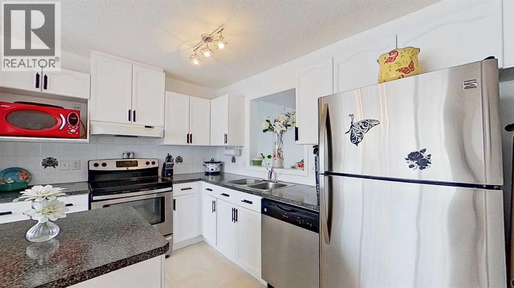 272 Rocky Ridge Court Nw, Calgary, Alberta  T3G 4S8 - Photo 8 - A2295188