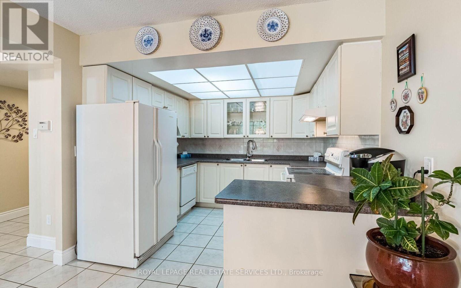 #202 - 310 Mill Street S, Brampton, Ontario  L6Y 3B1 - Photo 14 - W12899906