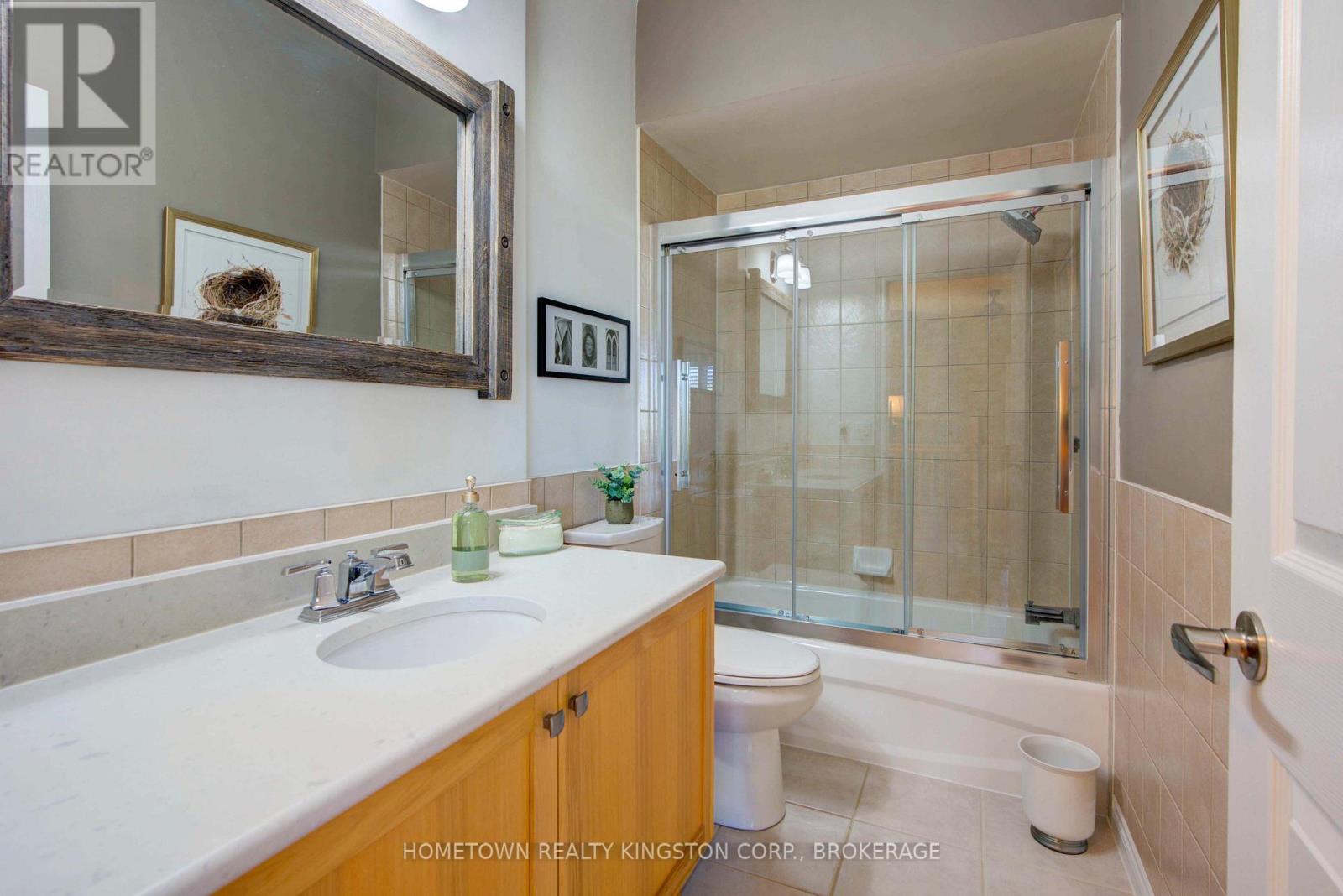 52 Glenora Drive, Loyalist, Ontario  K0H 1G0 - Photo 12 - X12946276