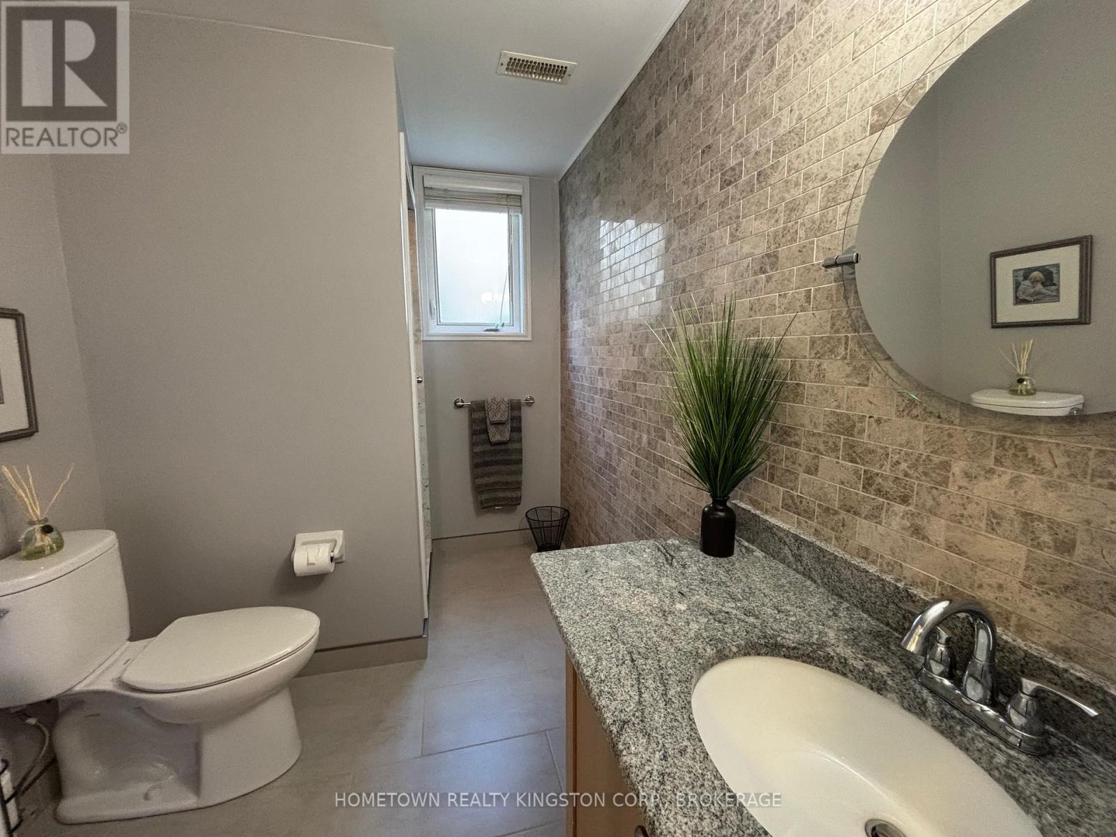 52 Glenora Drive, Loyalist, Ontario  K0H 1G0 - Photo 18 - X12946276