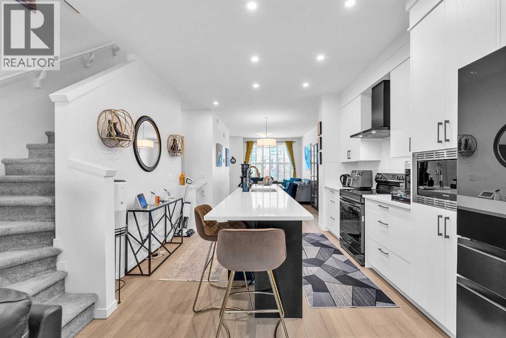 52 Edith Gate Nw, Calgary, Alberta  T3A 1Z2 - Photo 12 - A2295677