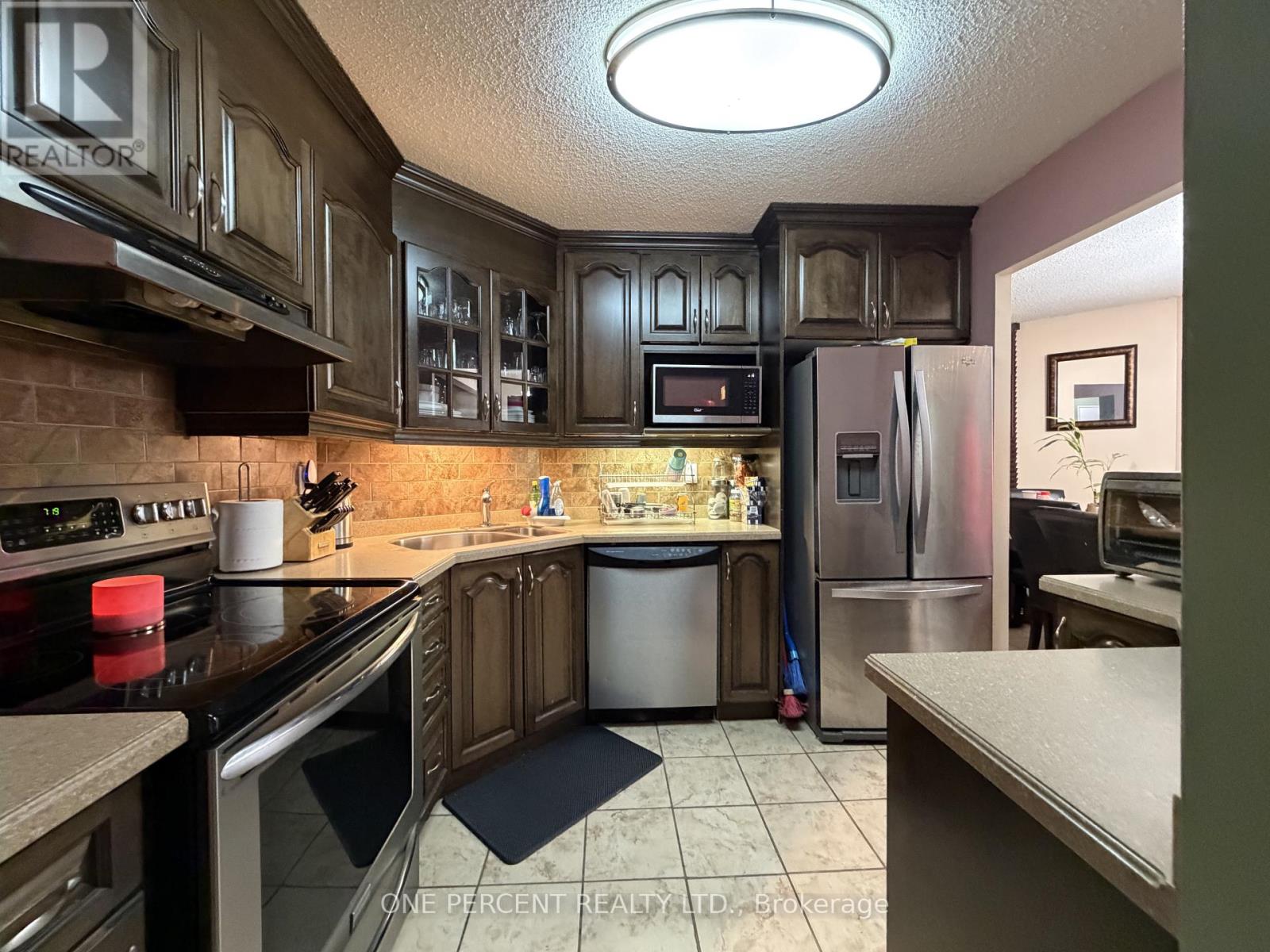 1408 - 41 Markbrook Lane, Toronto, Ontario  M9V 5E6 - Photo 4 - W12946442