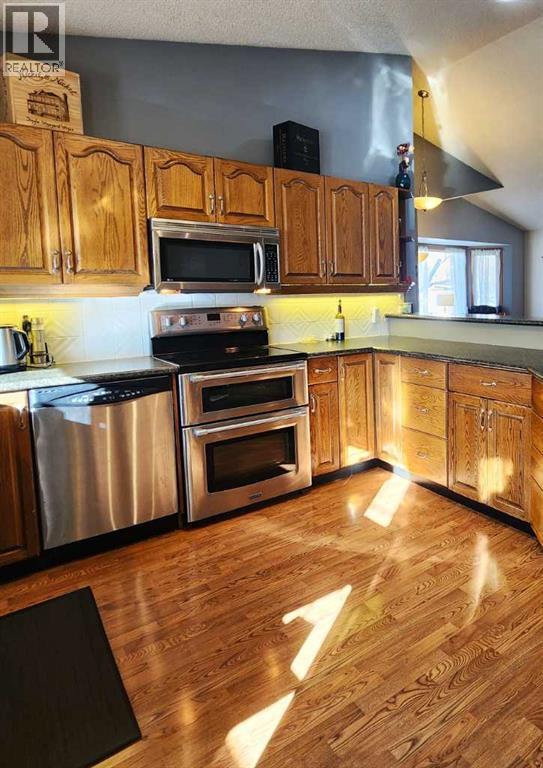 109 Downey Place, Okotoks, Alberta  T1S 1H3 - Photo 6 - A2295989