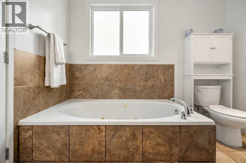 276 Riverside Mews SE, Calgary, Alberta  T2C 3Y8 - Photo 25 - A2296881