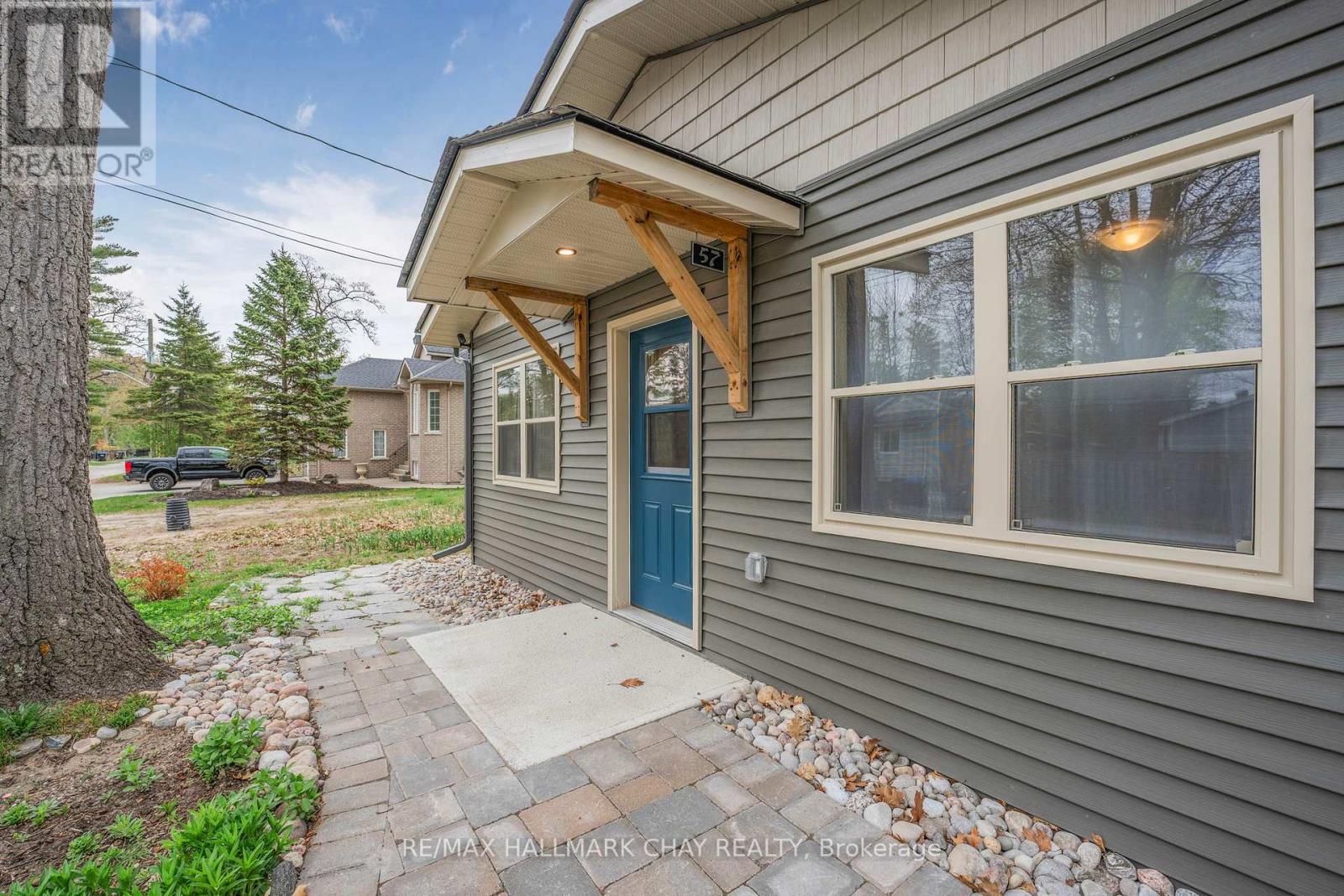 57 Laidlaw Street, Wasaga Beach, Ontario  L9Z 2L2 - Photo 4 - S12946780