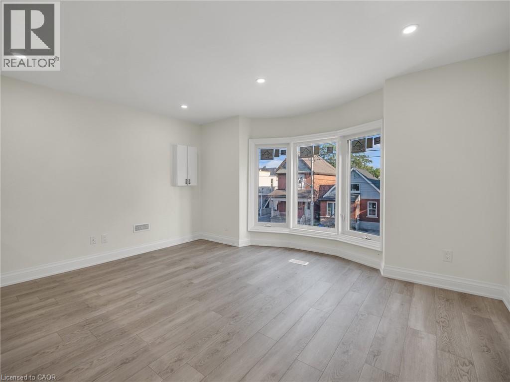 718 Cannon Street E Unit# Main Fl, Hamilton, Ontario  L8L 2G9 - Photo 2 - 40814033