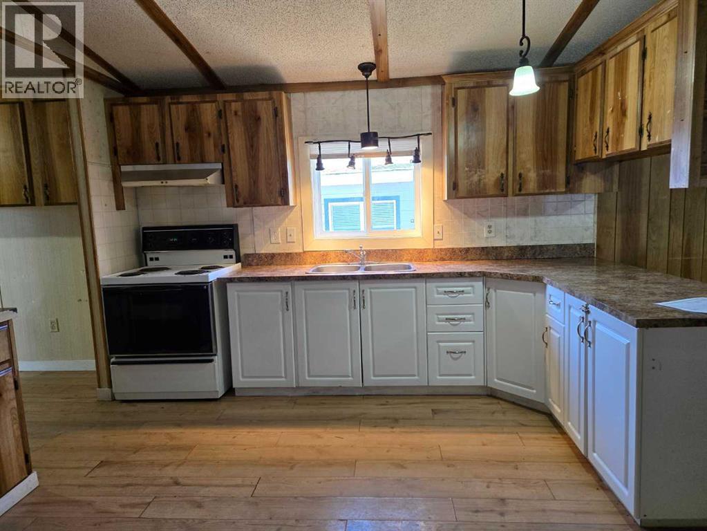 115 Sunset Way Ne, High River, Alberta  T1V 1J4 - Photo 6 - A2297994