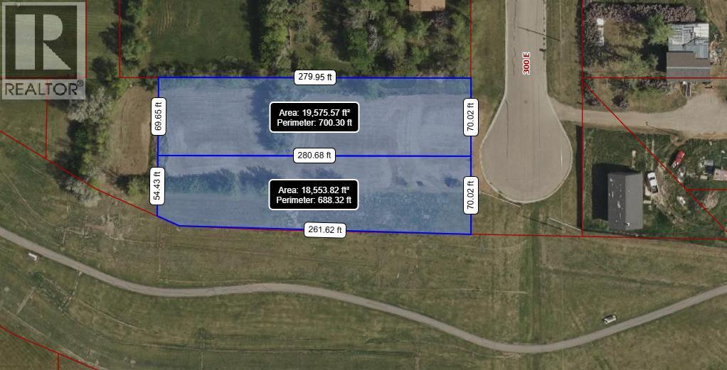 Lot 21 300 E, Raymond, Alberta  T0K 2S0 - Photo 1 - A2295873