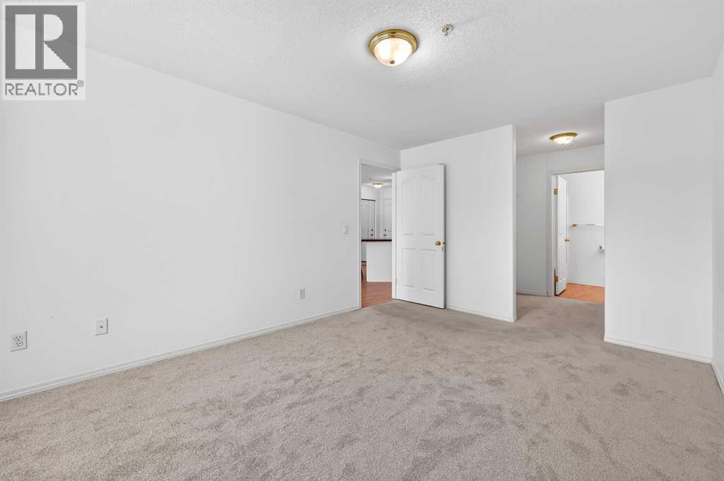 210, 165 Manora Place NE, Calgary, Alberta  T2A 7X5 - Photo 18 - A2278132