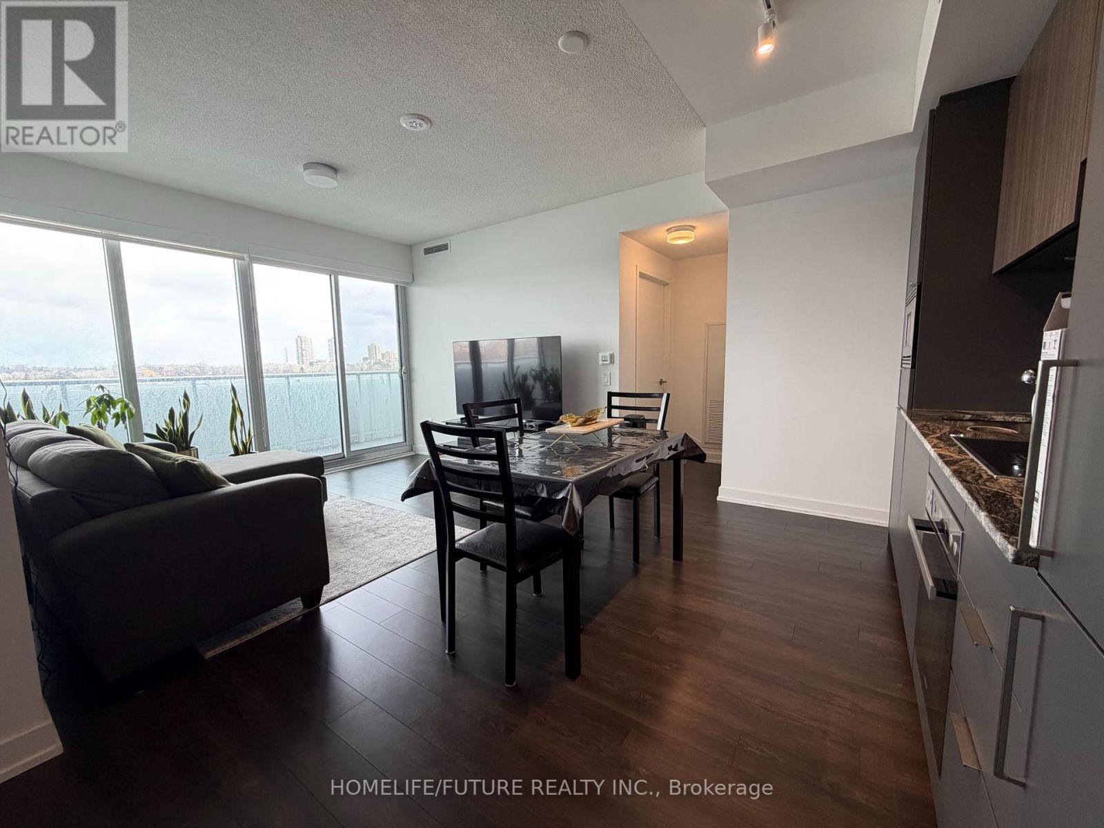 311 - 50 O' Neill Road, Toronto, Ontario  M3C 0R1 - Photo 2 - C12947344