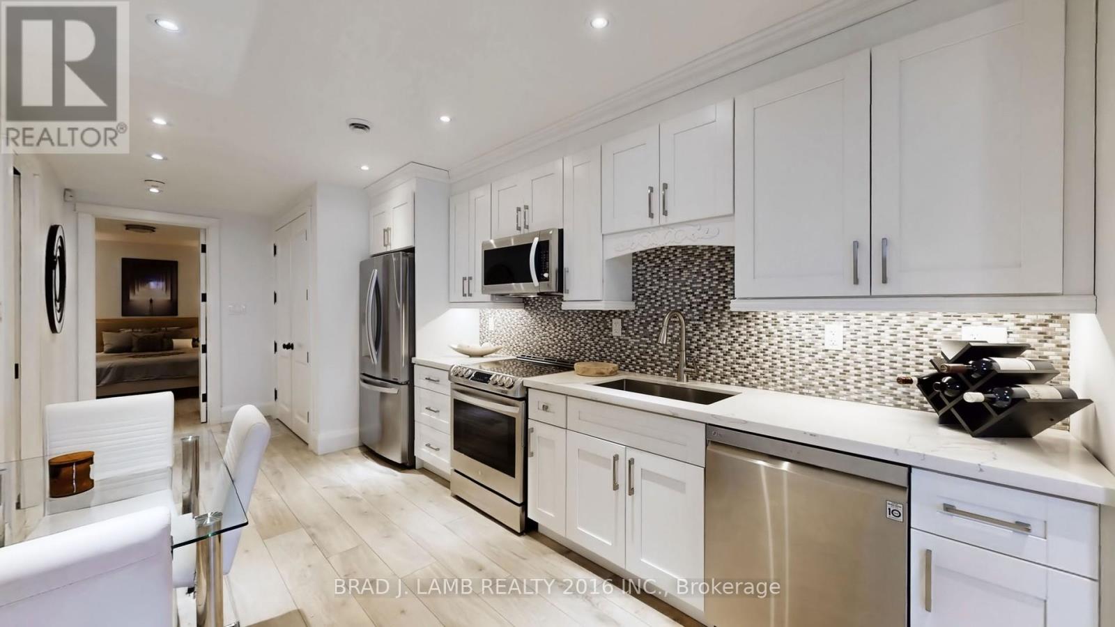 111 Woodbine Avenue, Toronto, Ontario  M4L 3P1 - Photo 19 - E12947180