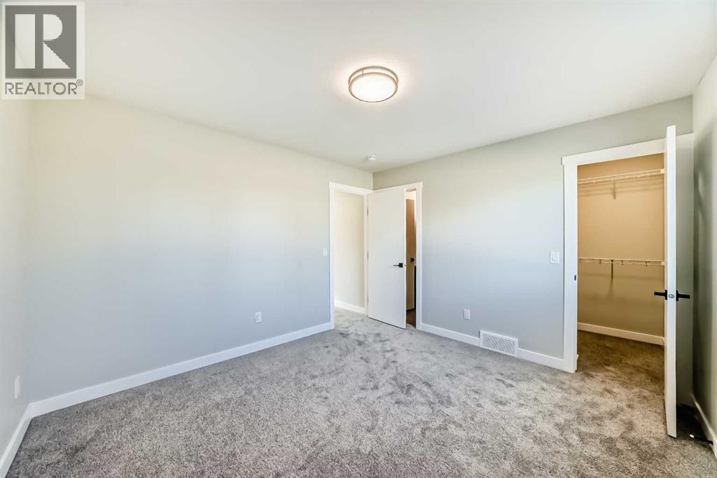 703 Clover Road, Carstairs, Alberta  T0M 0N0 - Photo 22 - A2297902