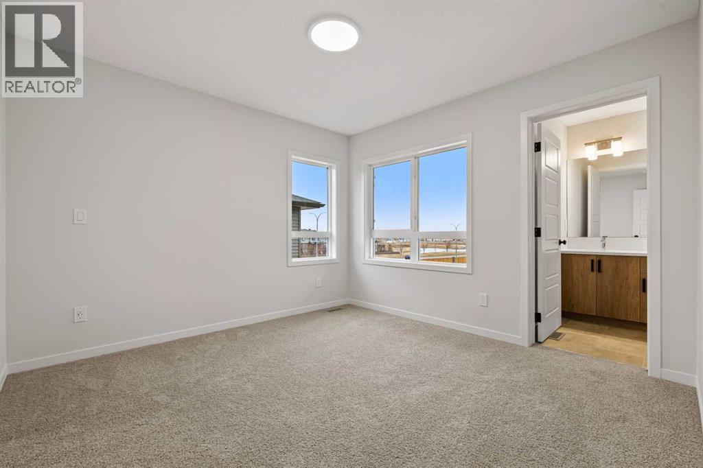 117 Bridgeport Gate, Chestermere, Alberta  T1X 3E5 - Photo 21 - A2285498