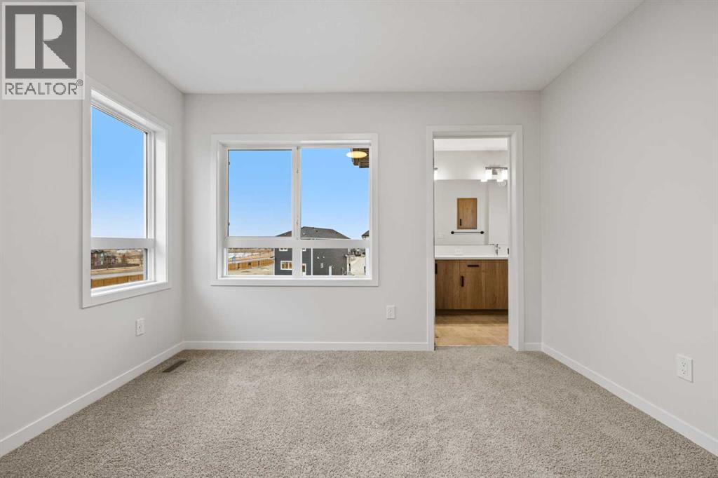 117 Bridgeport Gate, Chestermere, Alberta  T1X 3E5 - Photo 31 - A2285498