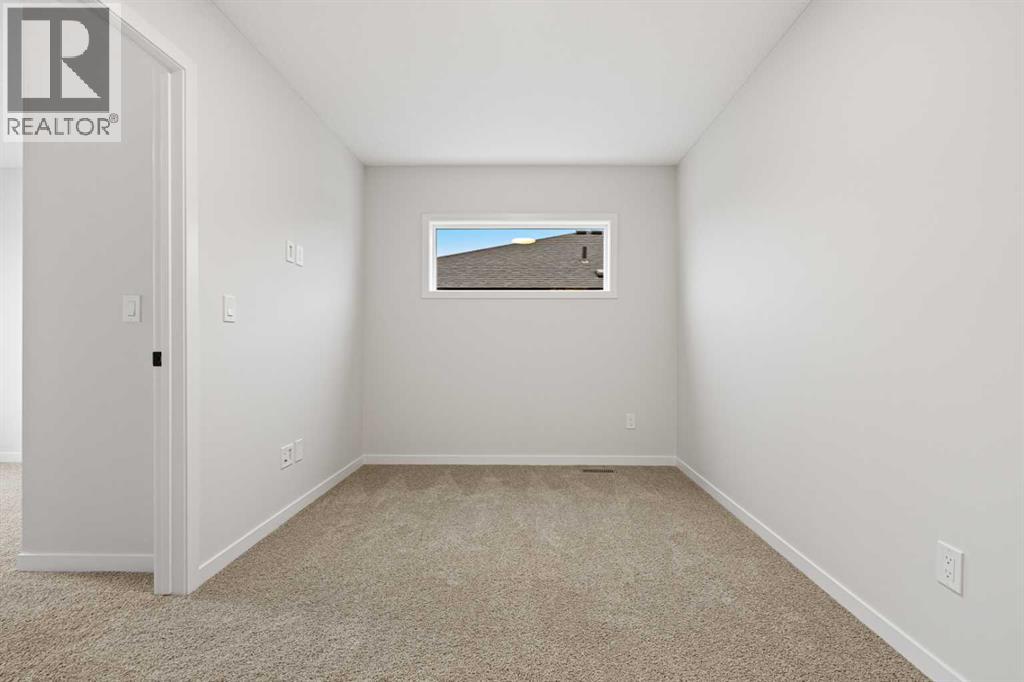 117 Bridgeport Gate, Chestermere, Alberta  T1X 3E5 - Photo 19 - A2285498