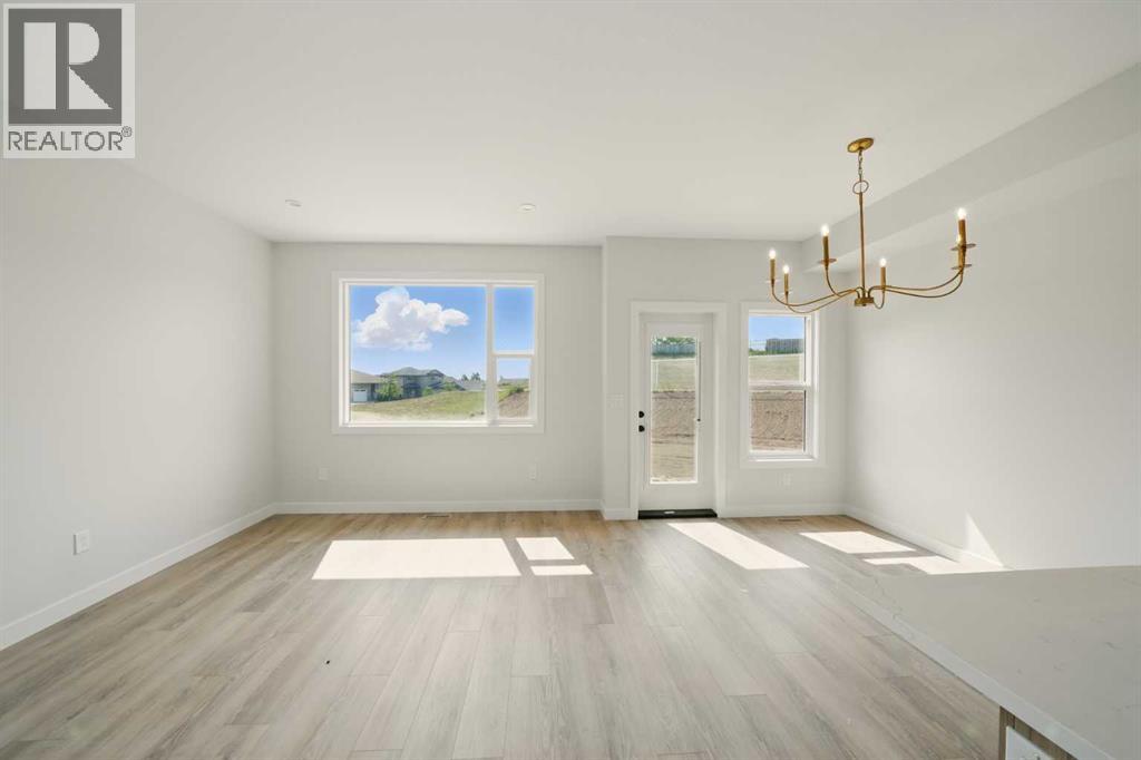 57 Pinnacle Close, Blackfalds, Alberta  T4M 0M3 - Photo 6 - A2284383