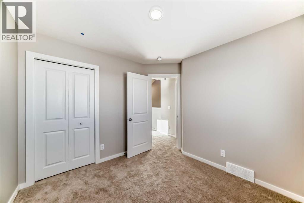 96 Creekside Rise Sw, Calgary, Alberta  T2X 6G8 - Photo 31 - A2289488