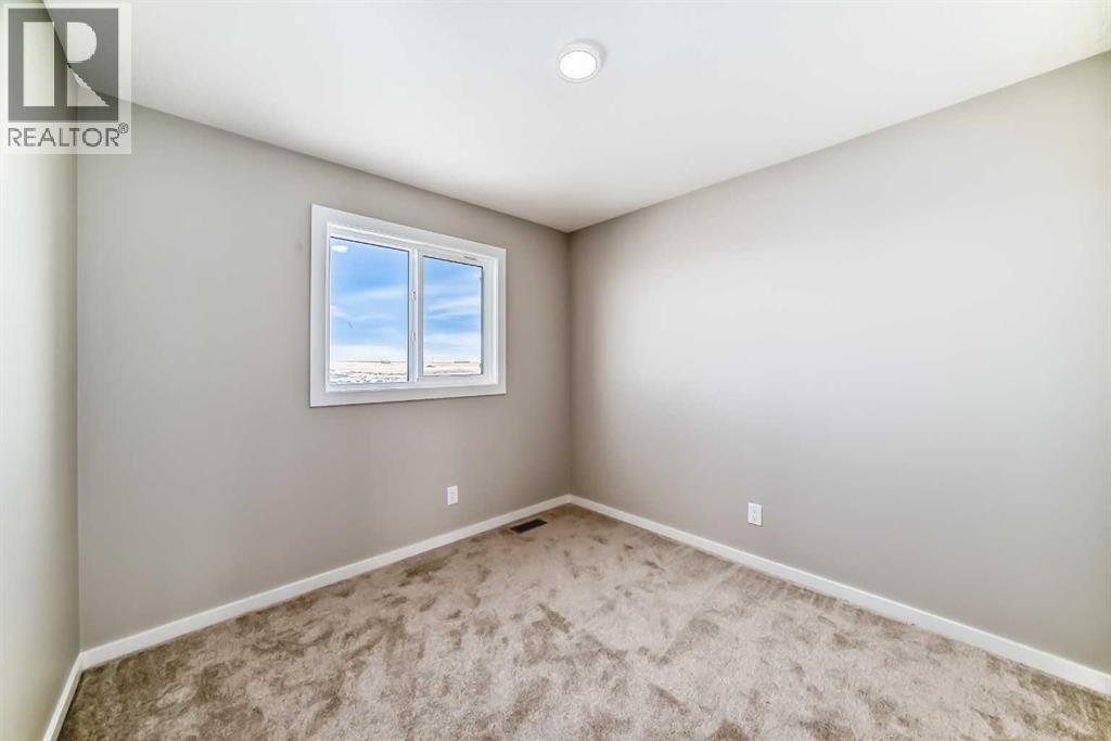 96 Creekside Rise Sw, Calgary, Alberta  T2X 6G8 - Photo 30 - A2289488