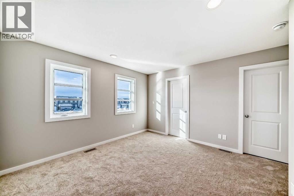 96 Creekside Rise Sw, Calgary, Alberta  T2X 6G8 - Photo 24 - A2289488