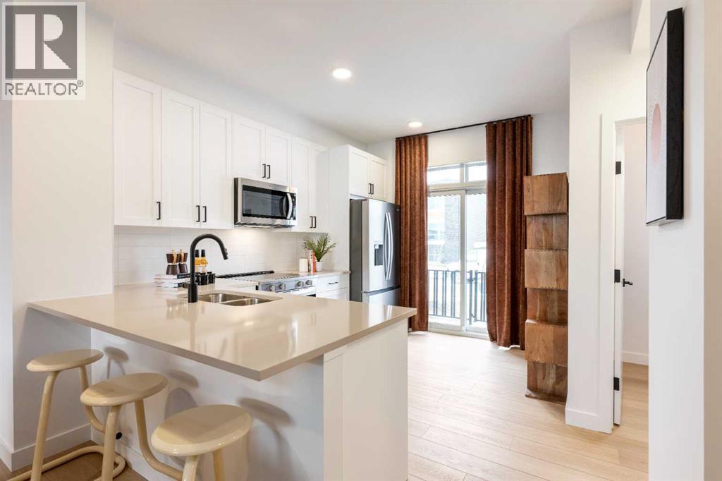 303, 437 Alpine Avenue SW, Calgary, Alberta  T2Y 0Z8 - Photo 5 - A2292888