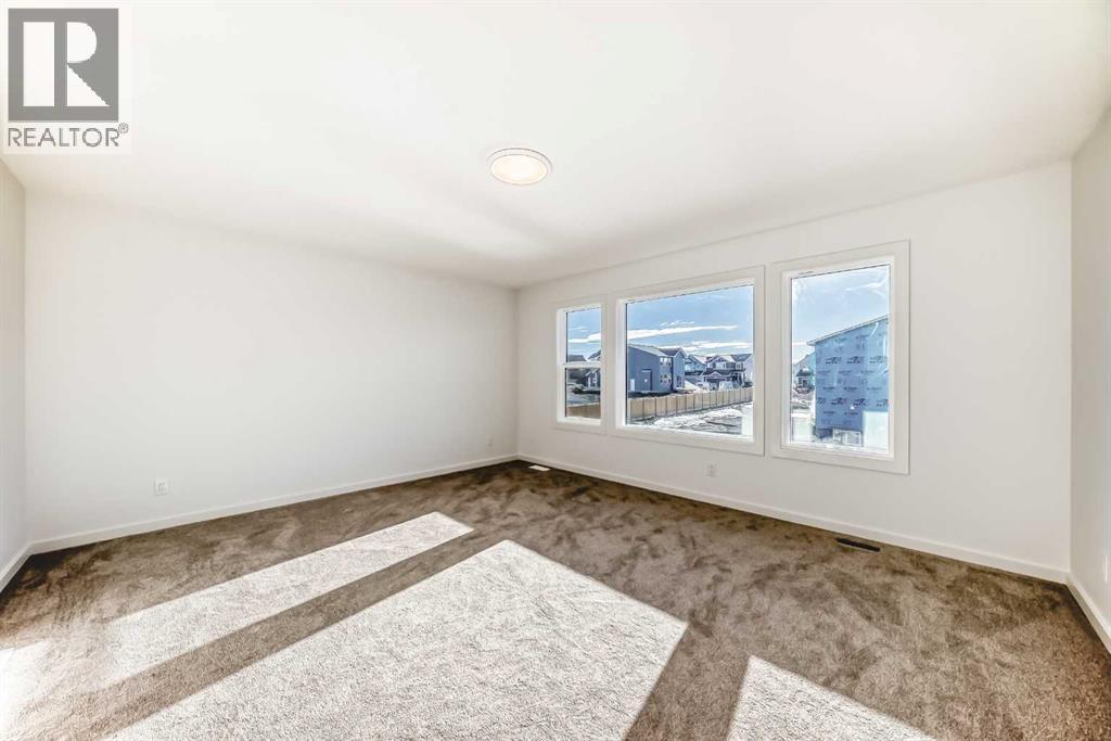 67 Creekside Path SW, Calgary, Alberta  T2X 5V9 - Photo 16 - A2294127