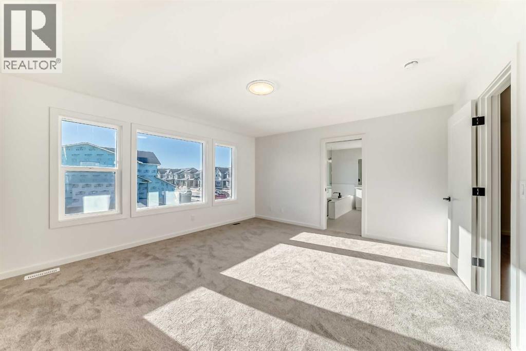 67 Creekside Path SW, Calgary, Alberta  T2X 5V9 - Photo 17 - A2294127