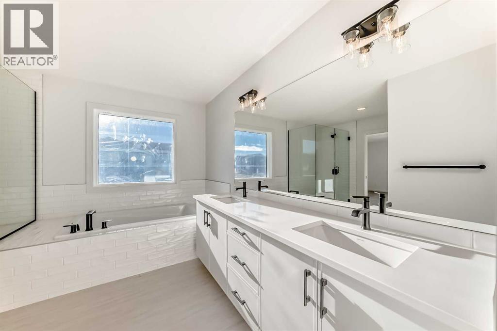 67 Creekside Path SW, Calgary, Alberta  T2X 5V9 - Photo 18 - A2294127