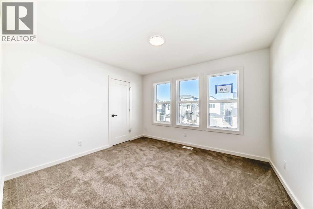 67 Creekside Path SW, Calgary, Alberta  T2X 5V9 - Photo 23 - A2294127