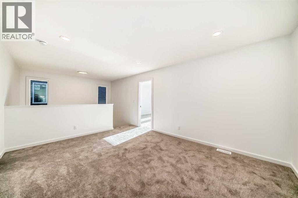 67 Creekside Path SW, Calgary, Alberta  T2X 5V9 - Photo 31 - A2294127