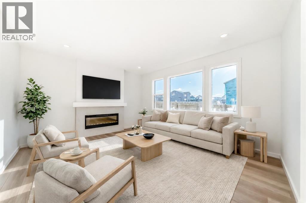 67 Creekside Path SW, Calgary, Alberta  T2X 5V9 - Photo 2 - A2294127