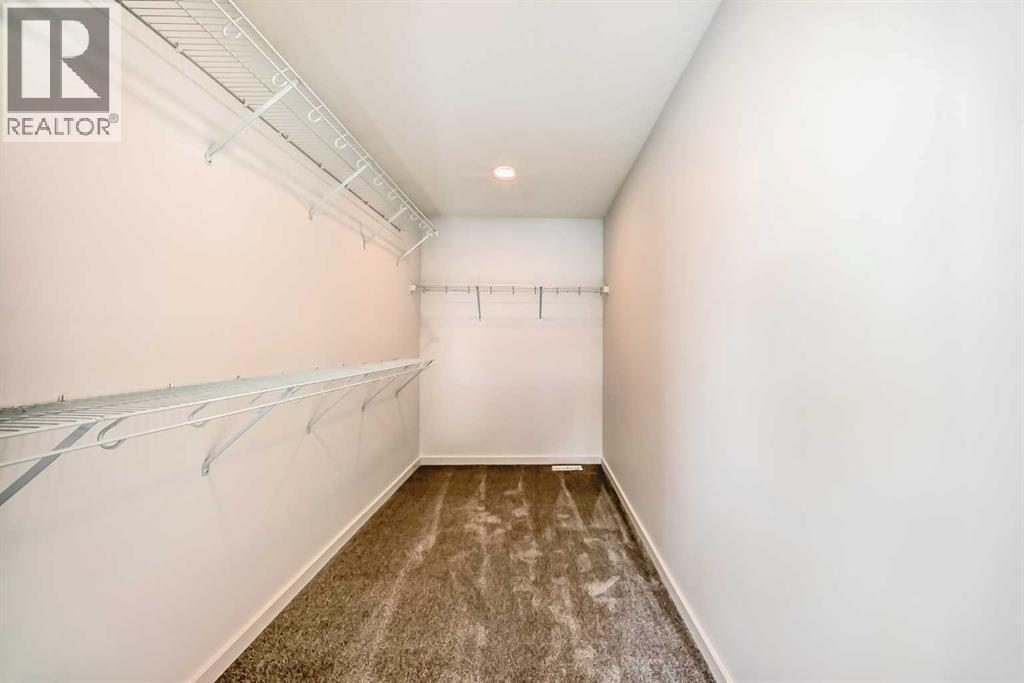 67 Creekside Path SW, Calgary, Alberta  T2X 5V9 - Photo 19 - A2294127