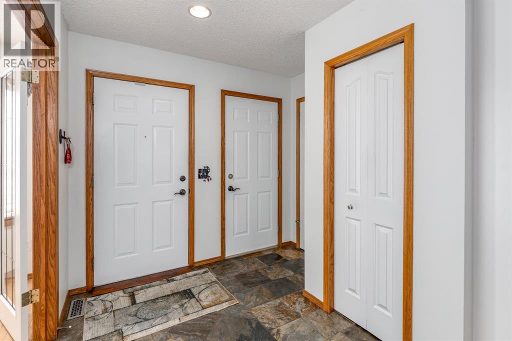 108 Quigley Close, Cochrane, Alberta  T4C 1S4 - Photo 4 - A2292444